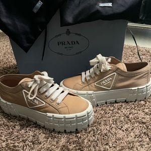 Prada platform sneaker runs half size big